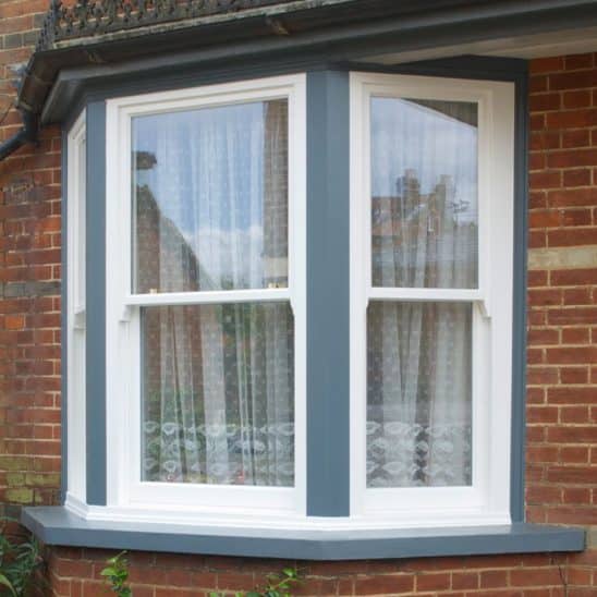 Traditional timber sash windows with complementary sash and frame colours in Woodbridge
