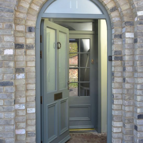 Arched Timber 'Kingston' Entrance Door in Tent Grey with Sandblasted Glass, Samuel Heath Abtuque Brass Unlacquered Furniture & Coordinating Internal Porch Door