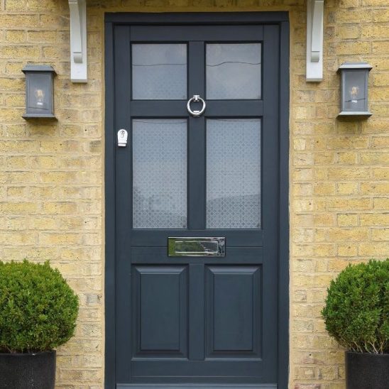Navy Timber Entrance Door with Etched Glass and Polished Chrome Furniture