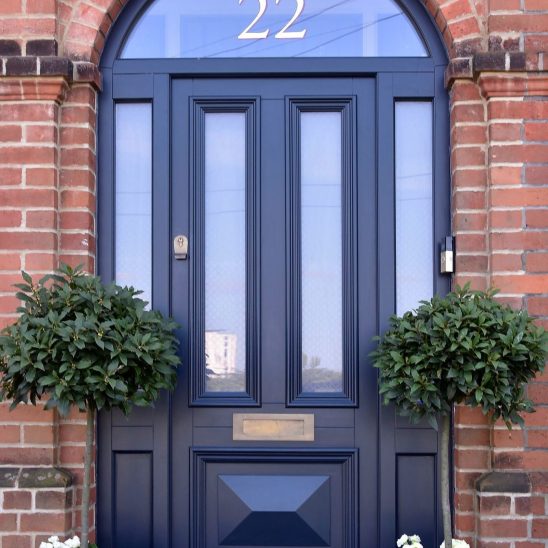 Timber Entrance Door with side panels and arched fanlight