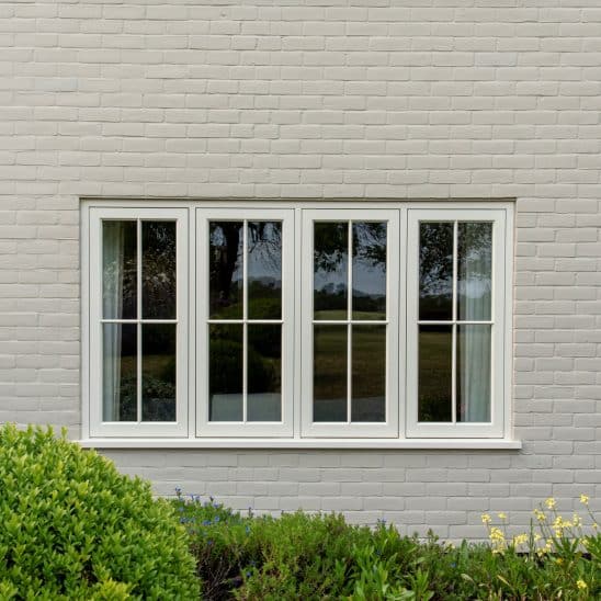 Timber flush casement windows in Farrow & Ball Slipper Satin