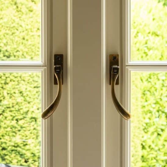 Timber flush casement windows in Farrow & Ball Slipper Satin