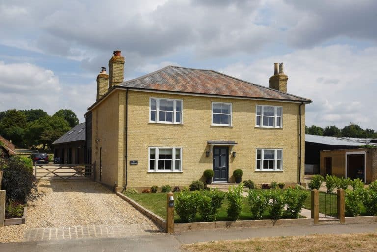 Smoke Cream Venetian hidden spring timber sash windows and Frenchay townhouse style door in Anthracite