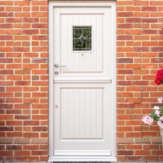 Staverton timber stable door with plank effect door panels & leaded glazed panel