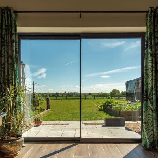 Sunflex thermally efficient aluminium sliding patio door with slim bars