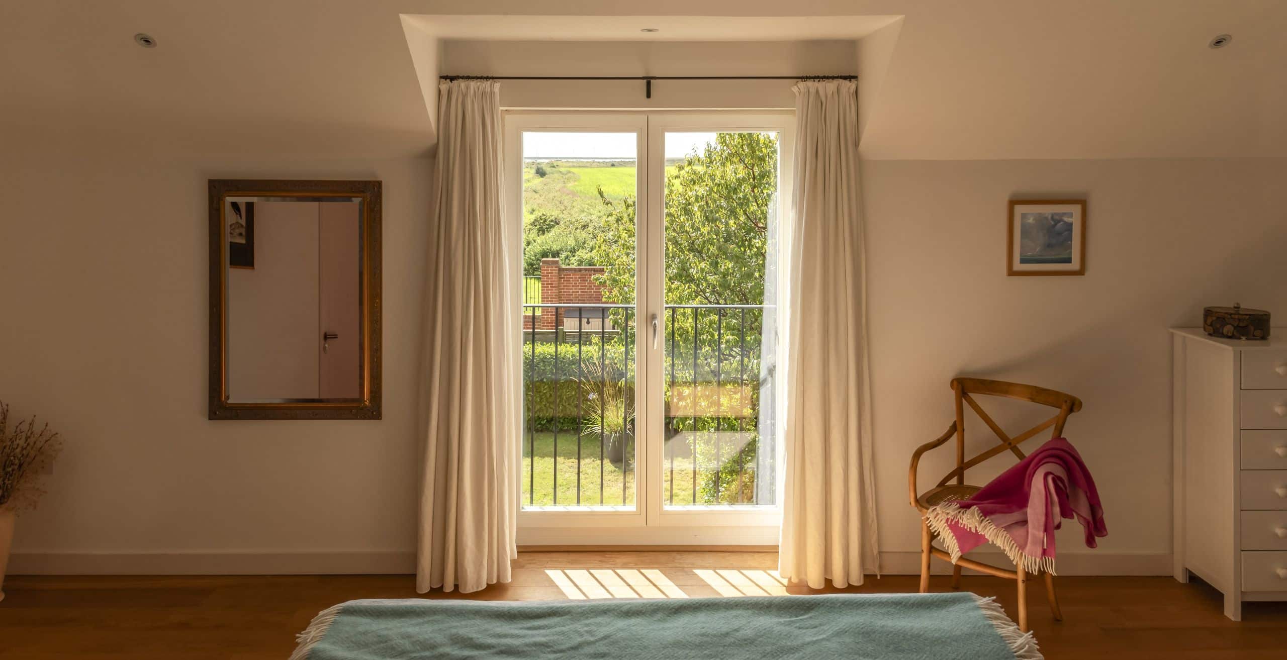 Tilt & Turn French windows with floating mullion and contemporary finish