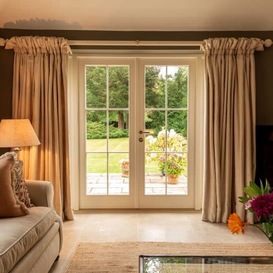Timber French doors & side panels with ovolo moulding & 18mm glazing bars