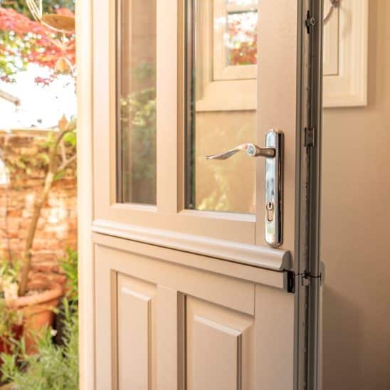 Timber Kingston stable door in French Grey with Regent 316 handle