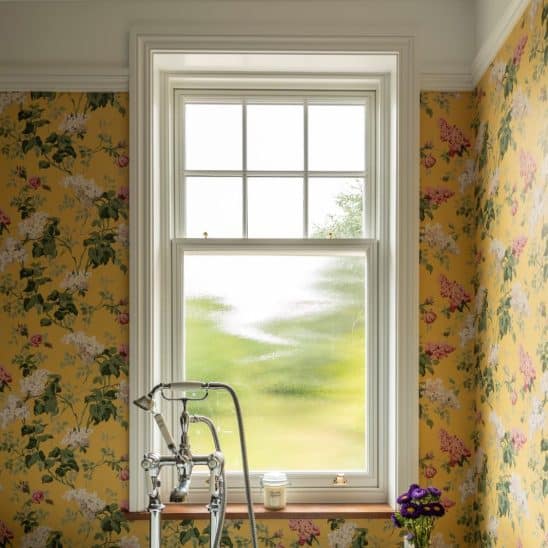 Slim wooden sash window with ovolo moulding and 18mm astragal squares to top sash