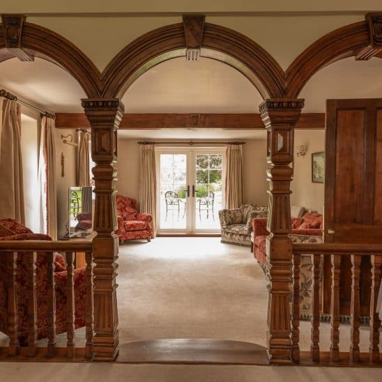 Evolution french doors with black wrought iron lever handle