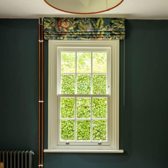 Traditional timber sash window with 18mm astragal bars in white