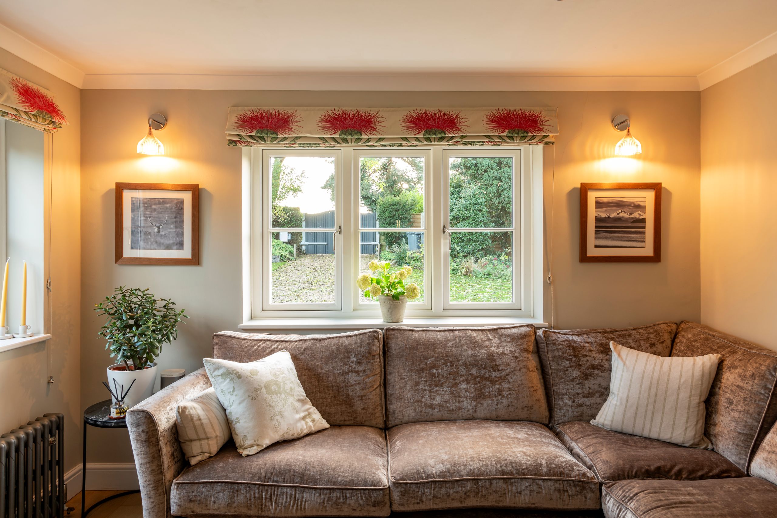 Evolution timber alternative windows with sofa in front lighting and blind