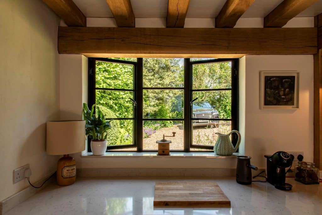 Aluco aluminium steel look windows with super slim glazing bars in black