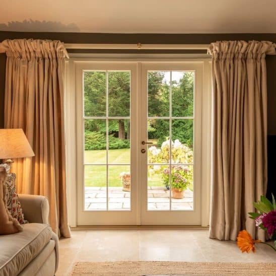 Timber French doors & side panels with ovolo moulding & 18mm glazing bars