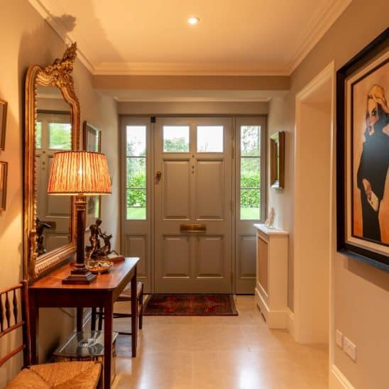 Timber Chalfont townhouse door with side panels, 18mm glazing bars & polished brass furniture