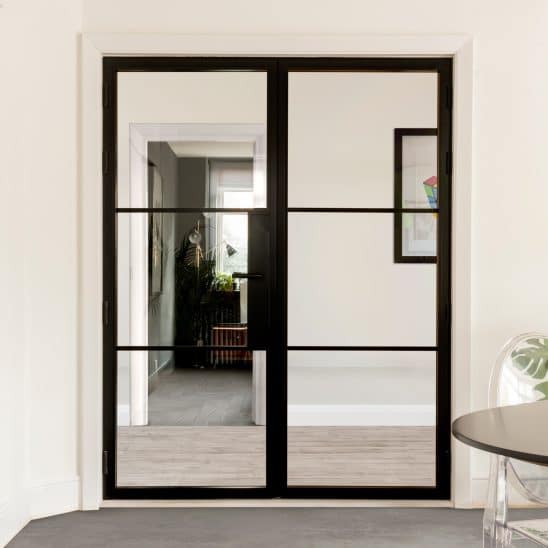 Aluco Internal steel look French doors with Leon handle and 20mm astragal bars