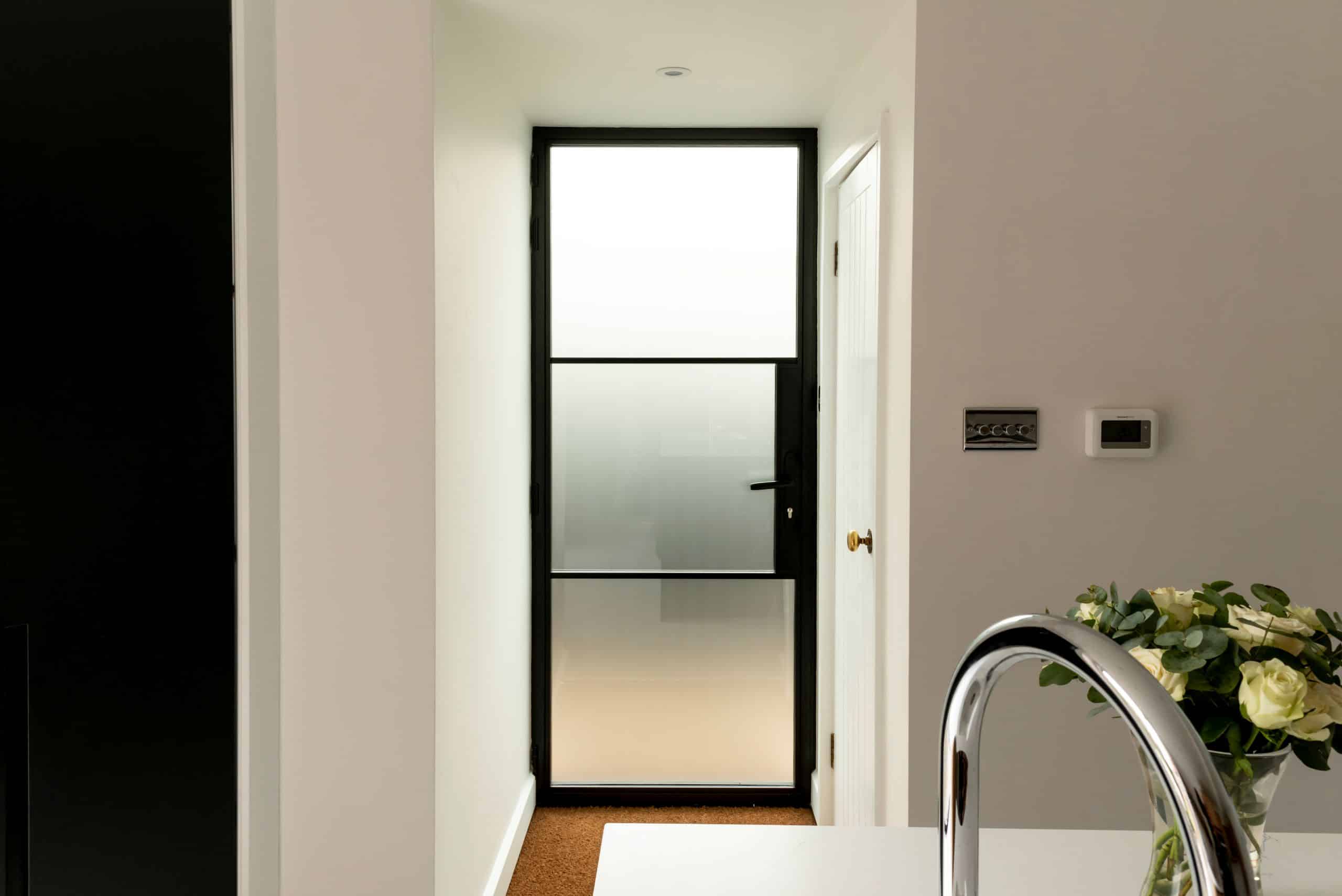 Aluco aluminium steel look back door with obscured glass