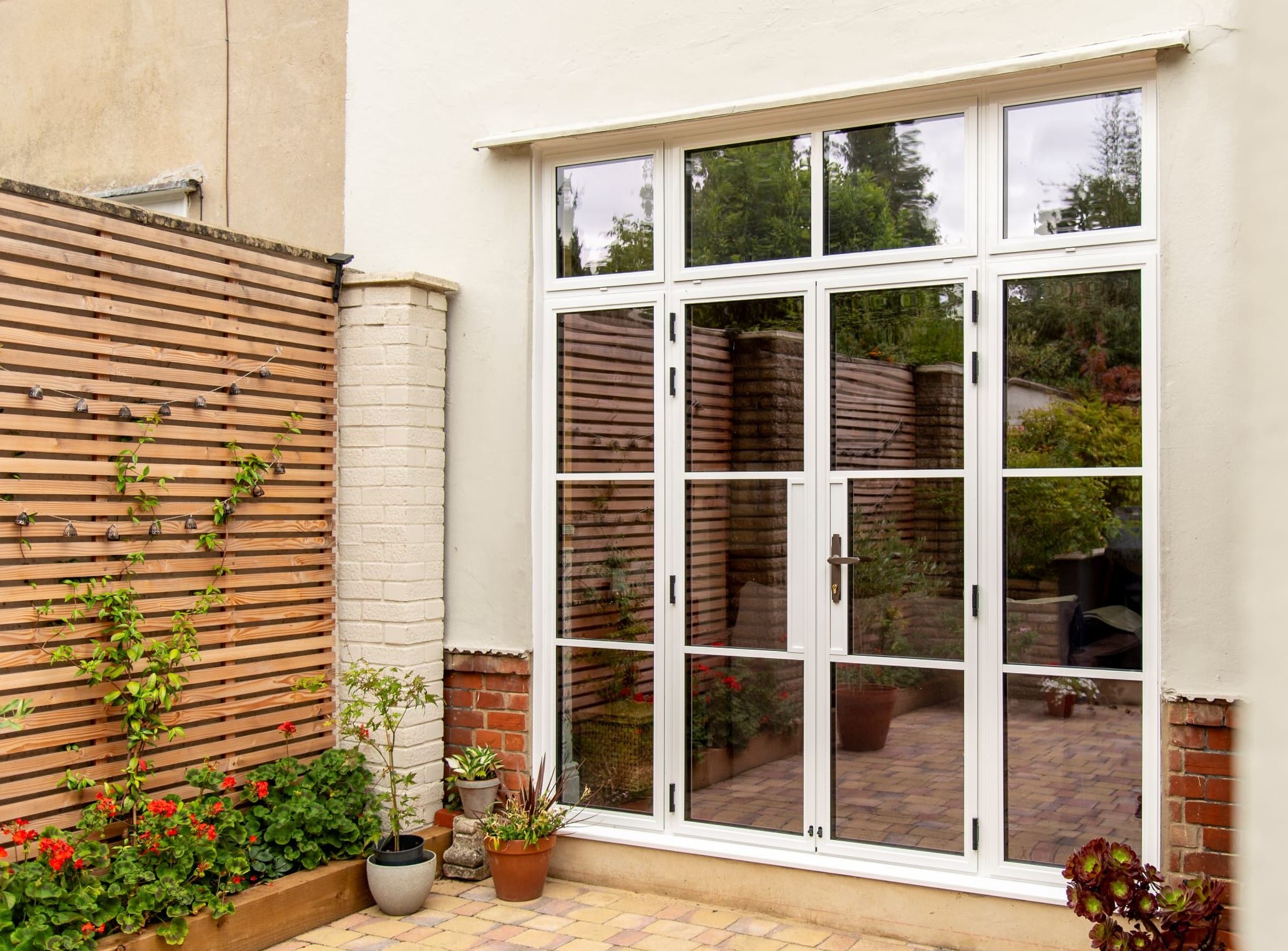 Aluco Art Deco French doors in dual colour - white on the outside and black inside