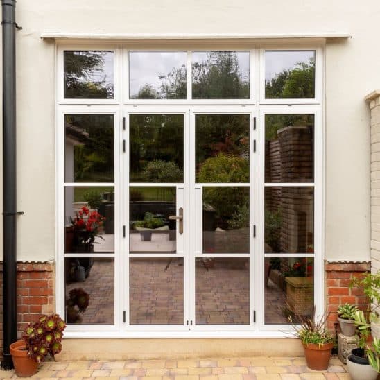 Aluco Art Deco French doors in dual colour - white on the outside and black inside