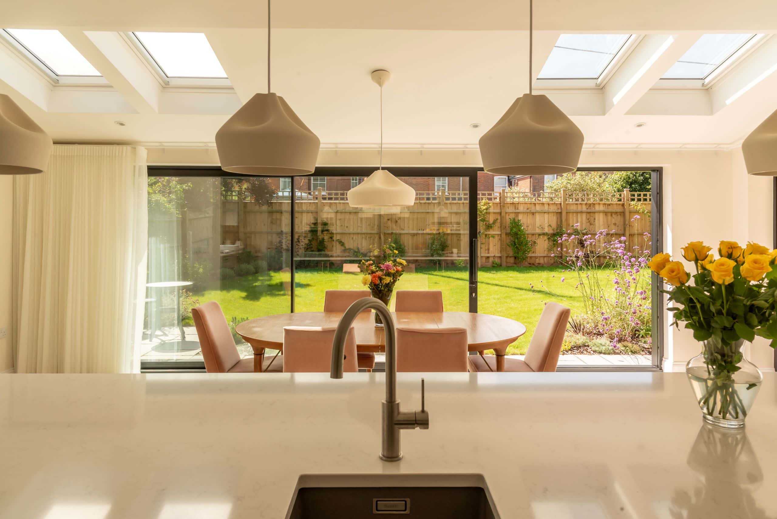 Black Sunflex SVG20 ultra slim aluminium sliding doors with 20mm interlock.