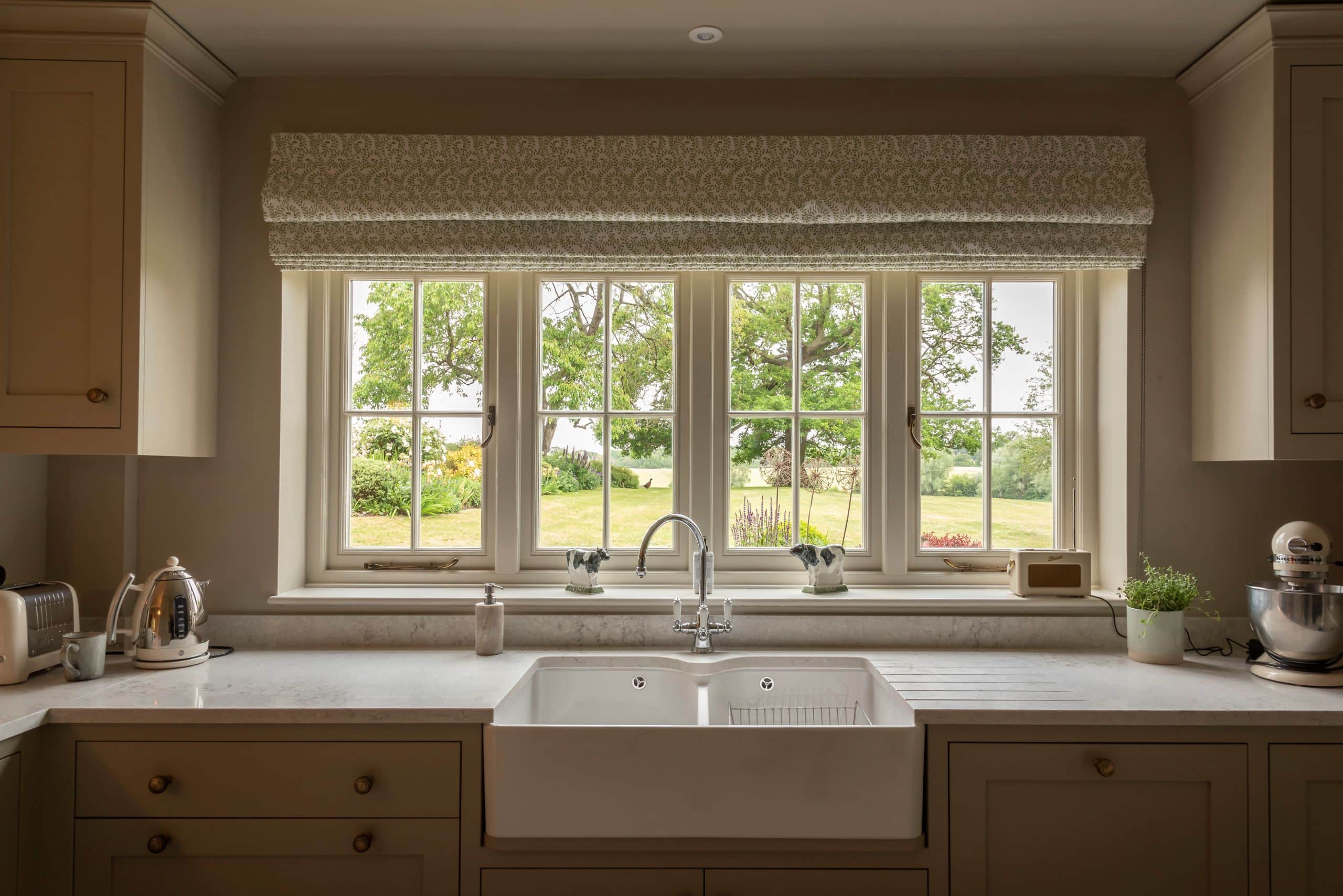 Timber flush casement window in Farrow & Ball Slipper Satin with 18mm astragal bars