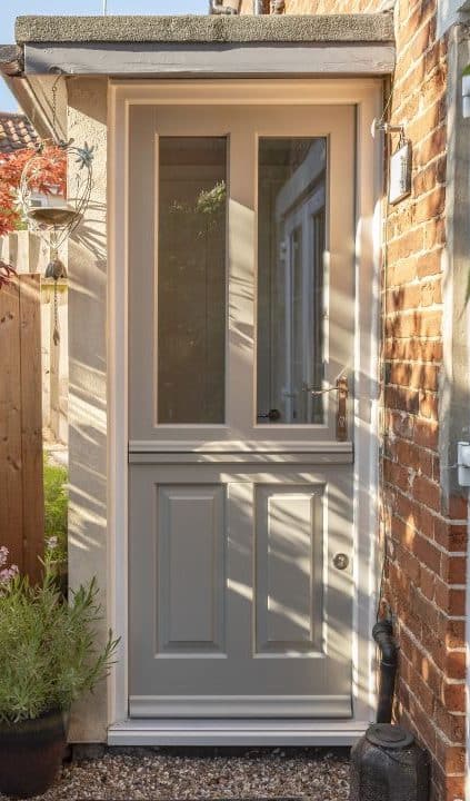 'Kingston' hardwood Timber stable door in French Grey with Regent 316 polished stainless steel handle