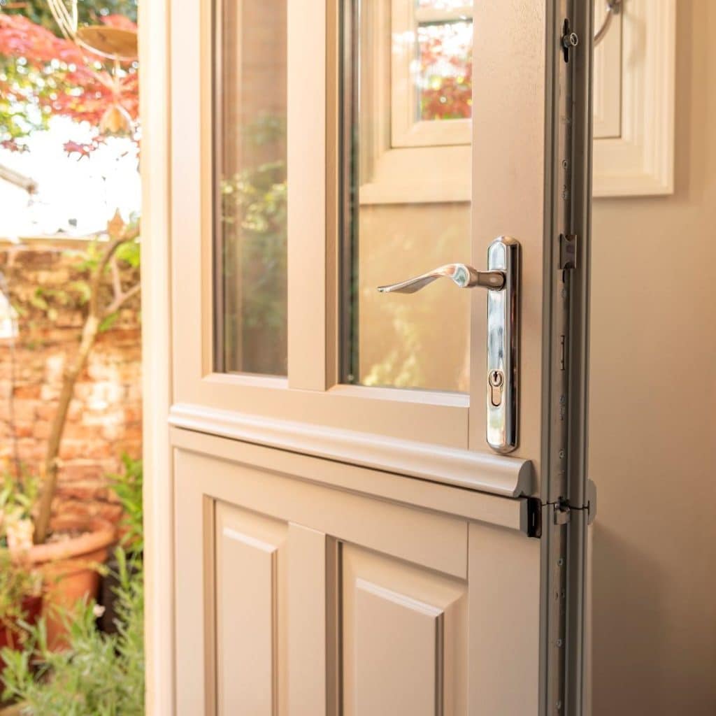 Engineered timber Kingston townhouse stable door in French Grey with 316 Coastal handle.