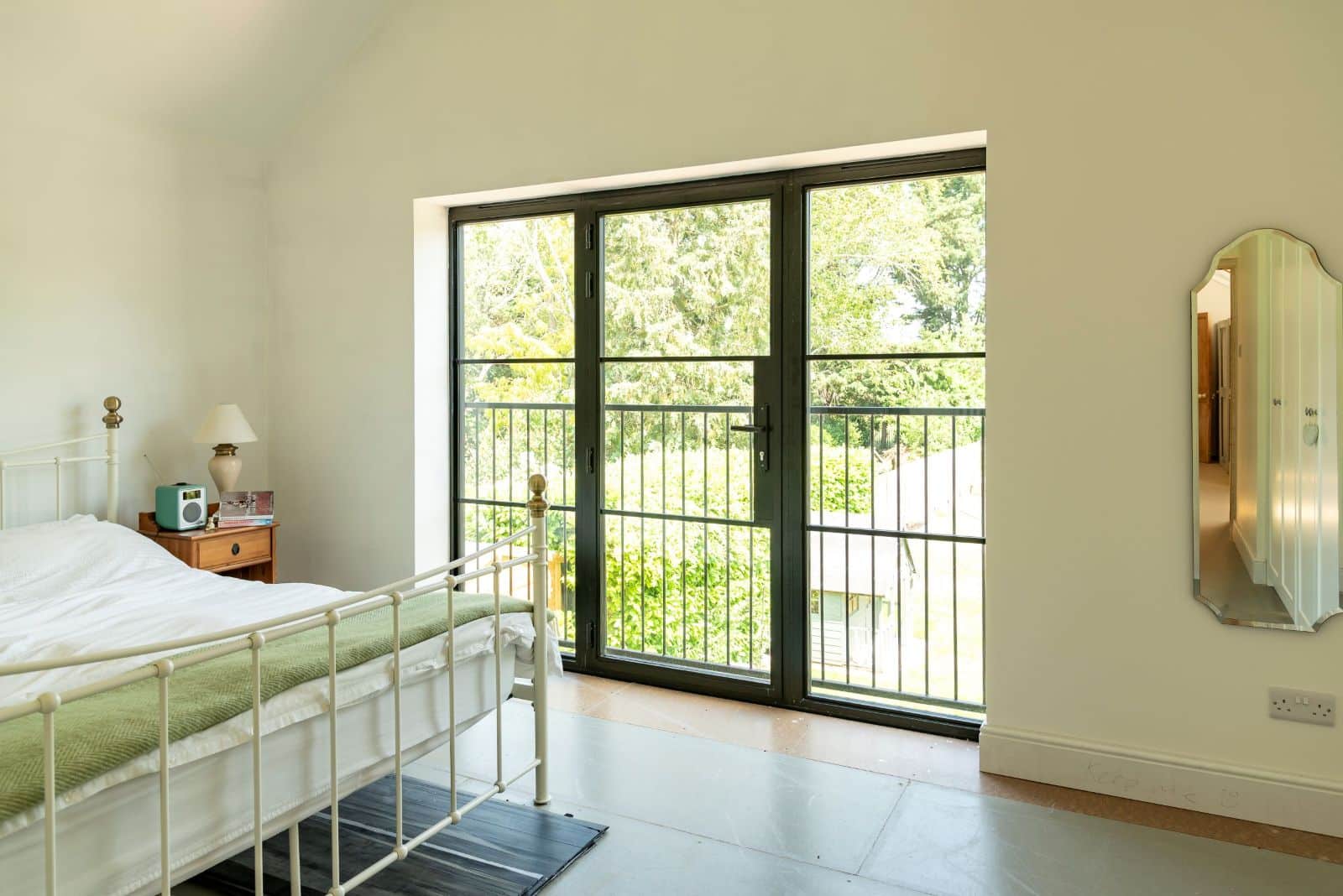 Aluco aluminium steel look French windows with side panels and super slim 20mm glazing bars in matt Black