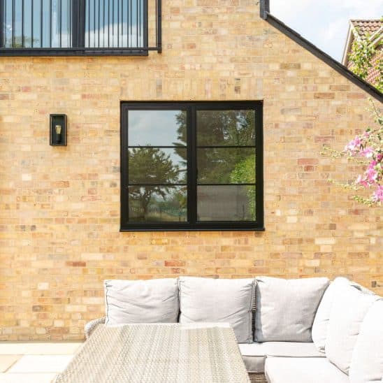 Aluco aluminium steel look window with super slim glazing bars in matt Black