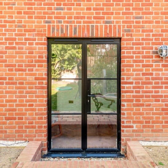 Black heritage, Art Deco aluminium patio doors with floating lock detail and Art Deco handle