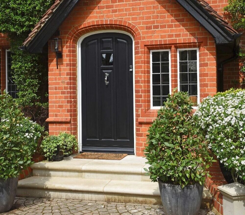 Engineered hardwood Norham townhouse entrance door in black with Samuel Heath Chrome Plated Doctor's Door Knocker