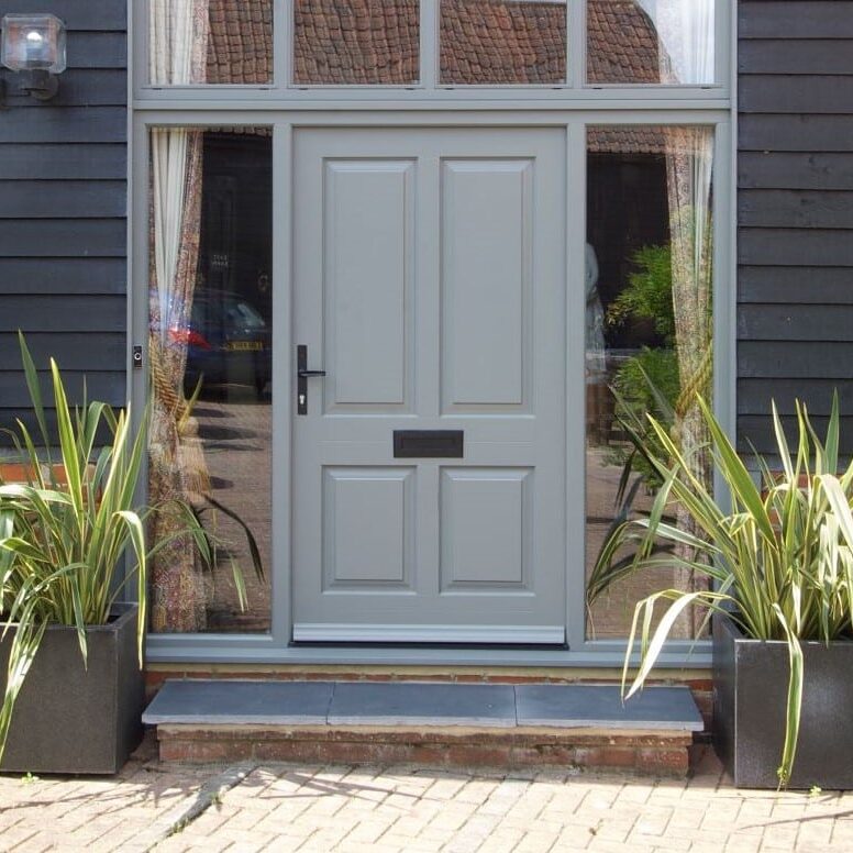 Bevington timber entrance door in London Grey with side and top lights