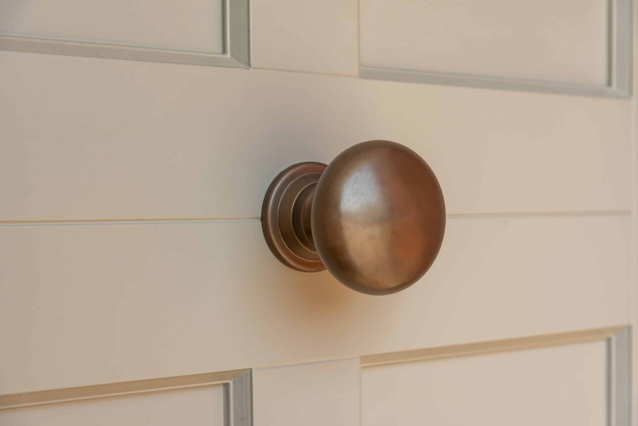 Samuel Heath bronze profile center door knob on timber Braithwaite door in French Grey