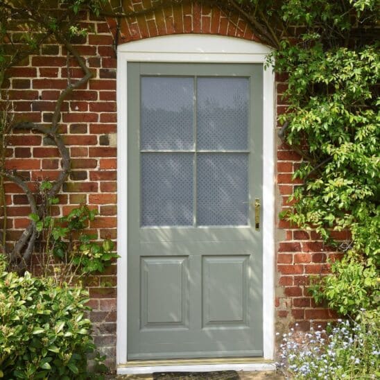 Timber Belbroughton door with etched star glass & chatsworth brass lever handle in Tent Grey